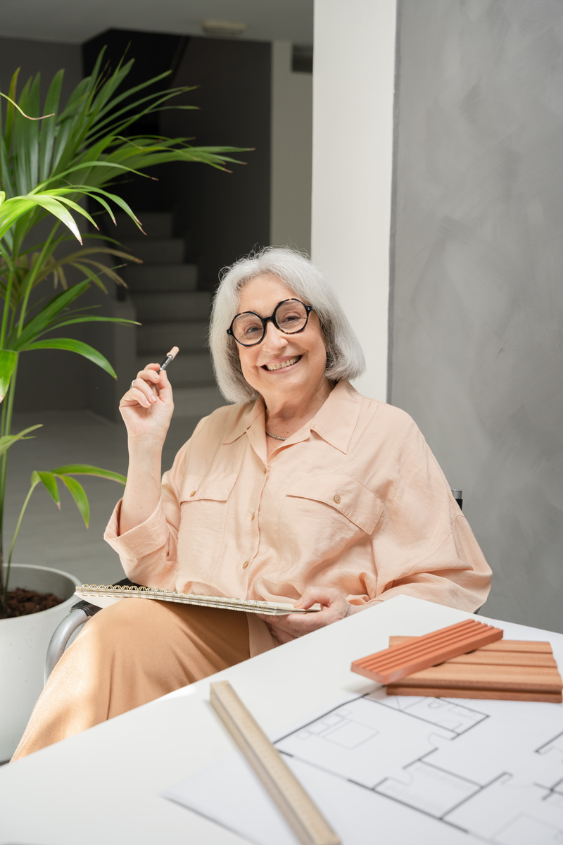 Elderly Woman Working at an Architecture Firm 